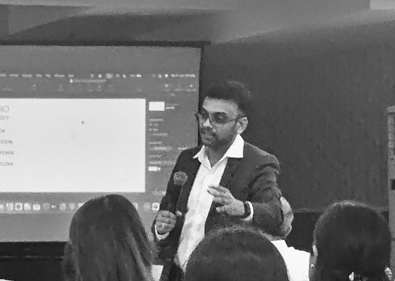 Dr. Kunal Banka speaking at a dental conference
