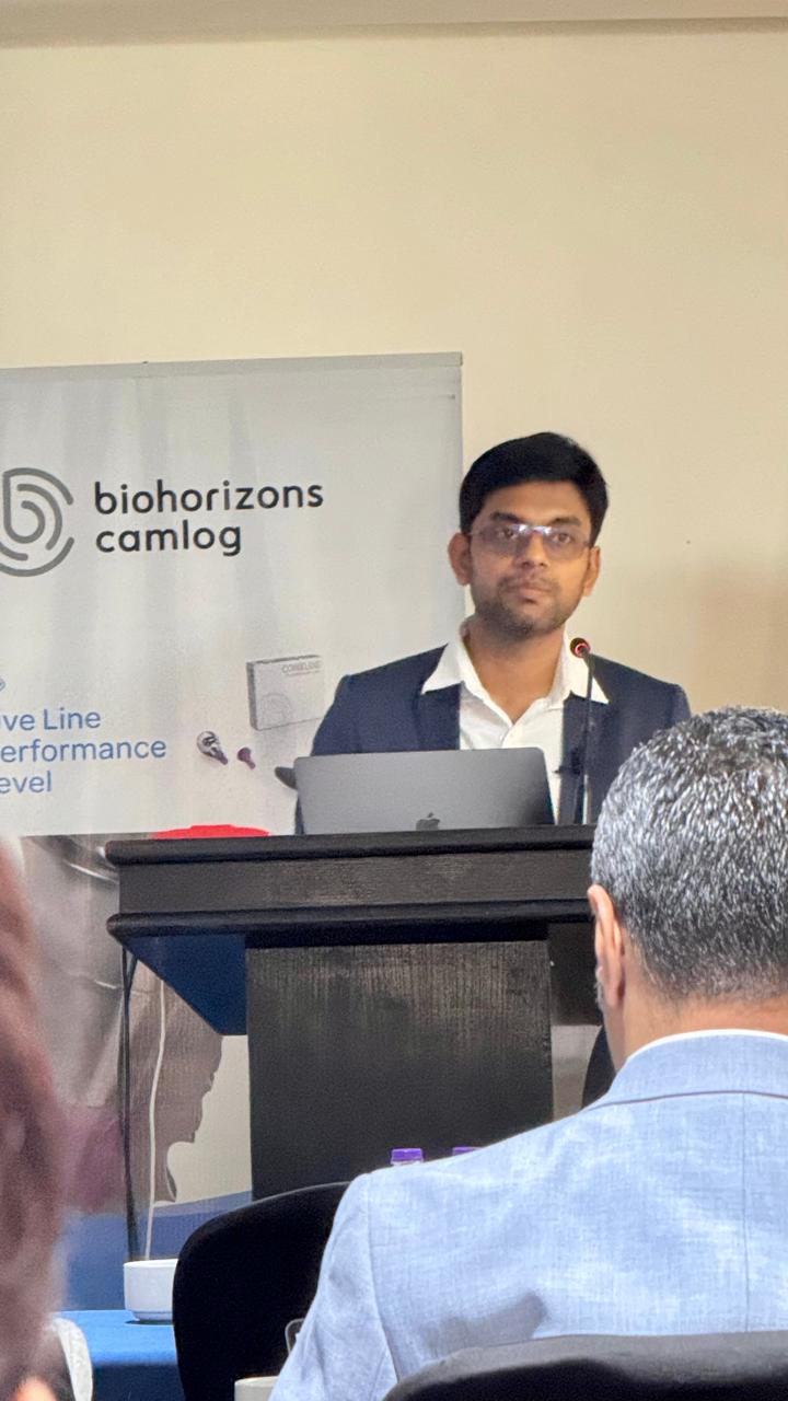 Dr. Kunal Banka speaking at a dental conference