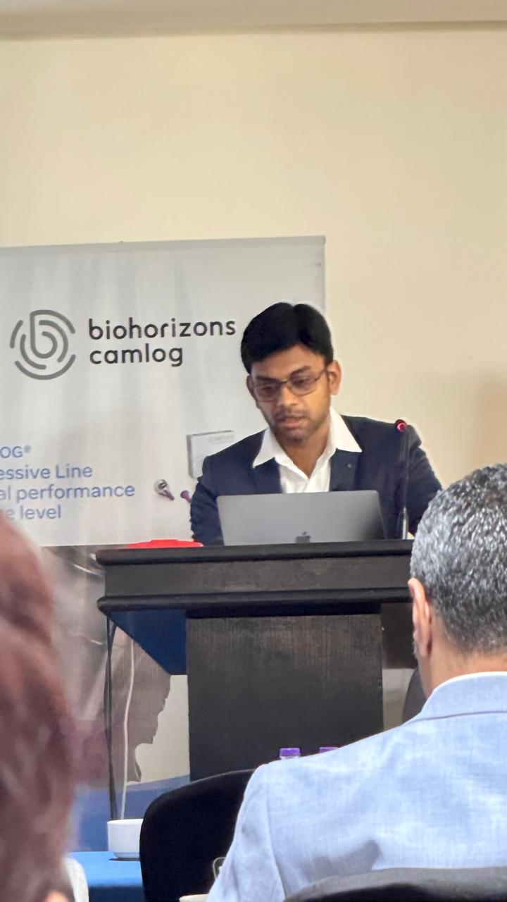 Dr. Kunal Banka speaking at a dental conference